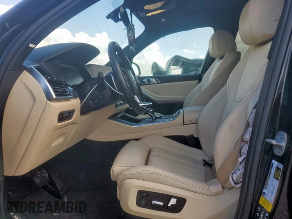 2019 BMW X5 xDrive40i with VIN 5UXCR6C54KLL35873, listed as a Copart auction lot 64989745 with 129,538 mi miles and Salvage title. Bid and sale history available at DreamBid. Image 7.
