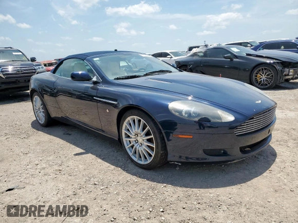 2007 Aston Martin DB9 z VIN SCFAD02A57GB08568, wystawiony jako Copart lot #57238375 z przebiegiem 41 255 mil mil oraz Tytuł czysty. Historia ofert i sprzedaży dostępna na DreamBid. Obrazek 4.