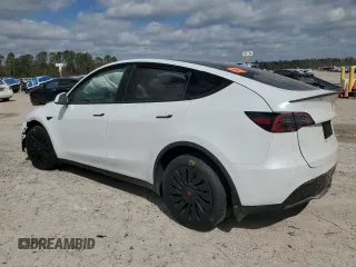 2024 Tesla Model Y Long Range with VIN 7SAYGDEE2RA335818, listed as a Copart auction lot 48821475 with 4,415 mi miles and Salvage Title. Bid and sale history available at DreamBid. Image 2.