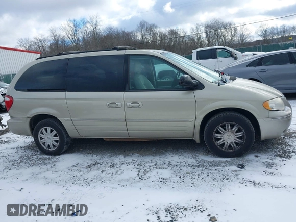 2006 Chrysler Town & Country LWB Touring with VIN 2A8GP54L86R887561, listed as a IAAI auction lot 41235389 with 124,554 mi miles. Bid and sale history available at carsss.com. Image 13.