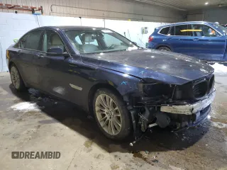 2015 BMW 7 Series 750i xDrive with VIN WBAYB6C57FD965931, listed as a Copart auction lot 44422205 with 100,702 mi miles and Salvage title. Bid and sale history available at DreamBid. Image 4.