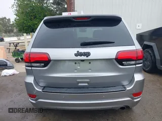 2017 Jeep Grand Cherokee Laredo with VIN 1C4RJEAG0HC702195, listed as a IAAI auction lot 42427597 with 104,403 mi miles and . Bid and sale history available at DreamBid. Image 17.