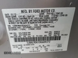 2013 Lincoln MKS with VIN 1LNHL9DK1DG604272, listed as a Copart auction lot 52880255 with 132,768 mi miles and Clean title. Bid and sale history available at DreamBid. Image 12.