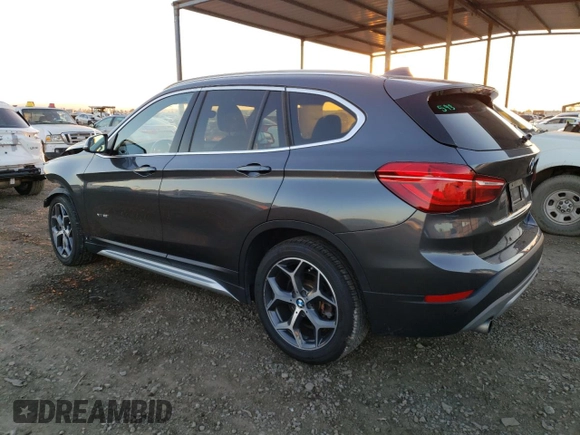 2017 BMW X1 xDrive28i with VIN WBXHT3C30H5F71865, listed as a Copart auction lot 67841122 with 75,471 mi miles. Bid and sale history available at carsss.com. Image 2.