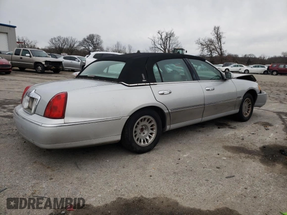 2001 Lincoln Town Car Cartier z VIN 1LNHM83W81Y629753, wystawiony jako Copart lot #36916024 z przebiegiem 150 875 mil mil oraz Szkoda całkowita • Salvage title. Historia ofert i sprzedaży dostępna na DreamBid. Obrazek 3.