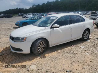 2012 Volkswagen Jetta SE with VIN 3VWDX7AJ7CM300856, listed as a Copart auction lot 64649535 with 176,789 mi miles and Salvage title. Bid and sale history available at DreamBid. Image 1.