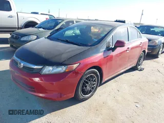 2012 Honda Civic LX z VIN 2HGFB2F59CH610547, wystawiony jako IAAI lot #41842440 z przebiegiem 125 097 mil mil oraz . Historia ofert i sprzedaży dostępna na DreamBid. Obrazek 2.