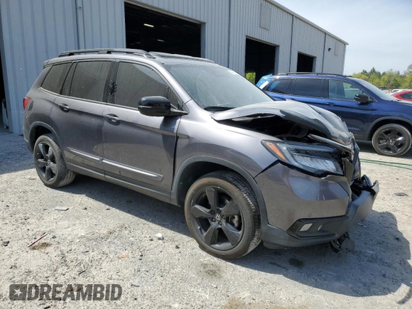 2021 Honda Passport Elite with VIN 5FNYF8H08MB014398, listed as a Copart auction lot 50499375 with 52,550 mi miles and Salvage Title. Bid and sale history available at DreamBid. Image 4.