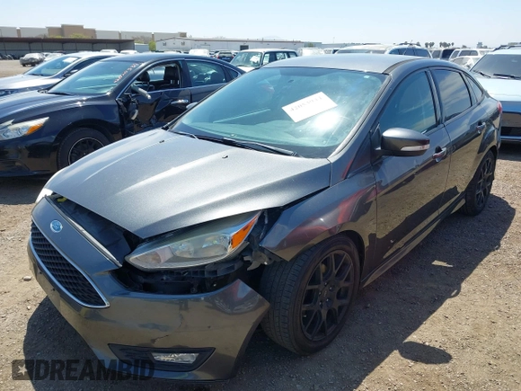 2016 Ford Focus SE with VIN 1FADP3F21GL268058, listed as a IAAI auction lot 42053944 with 103,785 mi miles and . Bid and sale history available at DreamBid. Image 6.