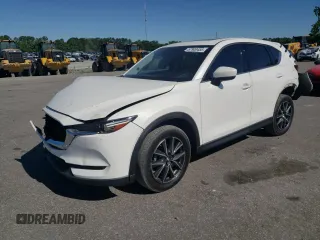 2018 Mazda CX-5 Grand Touring z VIN JM3KFADM9J0312322, wystawiony jako Copart lot #57900455 z przebiegiem Nie podano mil oraz Szkoda całkowita • Salvage title. Historia ofert i sprzedaży dostępna na DreamBid. Obrazek 1.