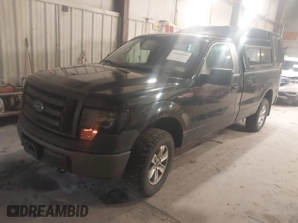 2012 Ford F-150 XL with VIN 1FTMF1EM9CKD89005, listed as a IAAI auction lot 42664014 with 142,413 mi miles and . Bid and sale history available at DreamBid. Image 2.