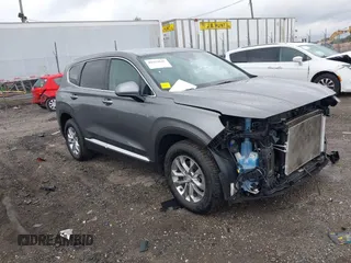 2019 Hyundai Santa Fe SEL z VIN 5NMS3CAD7KH035429, wystawiony jako IAAI lot #42323641 z przebiegiem 60 909 mil mil oraz . Historia ofert i sprzedaży dostępna na DreamBid. Obrazek 1.