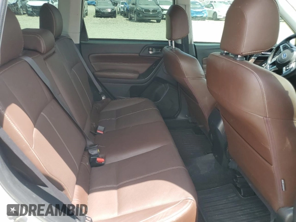 2018 Subaru Forester Touring with VIN JF2SJAWC4JH435749, listed as a Copart auction lot 63526465 with 143,029 mi miles and Salvage title. Bid and sale history available at DreamBid. Image 11.