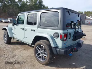 2024 Jeep Wrangler Sport S with VIN 1C4RJXN65RW166079, listed as a IAAI auction lot 41795439 with 14,937 mi miles and . Bid and sale history available at DreamBid. Image 3.