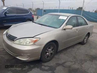 2004 Toyota Camry LE with VIN 4T1BF32K44U069081, listed as a IAAI auction lot 41460767 with 204,992 mi miles and . Bid and sale history available at carsss.com. Image 2.