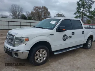 2014 Ford F-150 XL with VIN 1FTFW1CF9EKD01702, listed as a IAAI auction lot 41447899 with 185,247 mi miles. Bid and sale history available at carsss.com. Image 6.