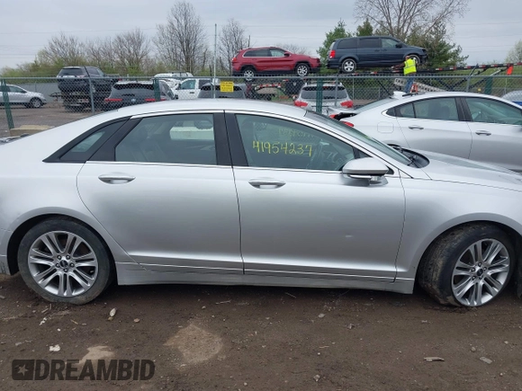 2013 Lincoln MKZ с VIN 3LN6L2GK0DR823324, выставлен на аукционе IAAI как лот 41954237 с пробегом 135 077 миль миль и . История ставок и продаж доступна на DreamBid. Изображение 13.