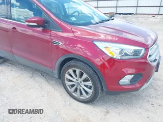 2018 Ford Escape Titanium with VIN 1FMCU0J96JUD58854, listed as a IAAI auction lot 42590609 with 77,825 mi miles and . Bid and sale history available at DreamBid. Image 6.