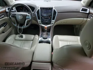 2016 Cadillac SRX Luxury Collection with VIN 3GYFNBE35GS569577, listed as a Copart auction lot 62568755 with 65,305 mi miles and Salvage title. Bid and sale history available at DreamBid. Image 8.