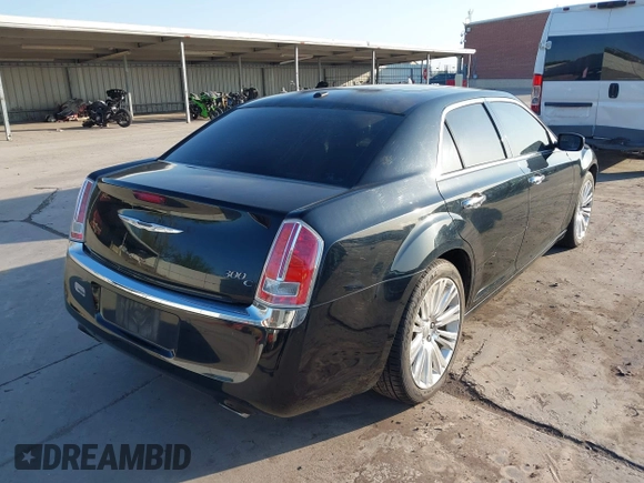2011 Chrysler 300 with VIN 2C3CA6CT8BH595198, listed as a IAAI auction lot 41983417 with 182,067 mi miles. Bid and sale history available at carsss.com. Image 4.