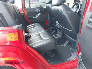 2014 Jeep Wrangler Unlimited Sahara z VIN 1C4BJWEGXEL179054, wystawiony jako IAAI lot #42151597 z przebiegiem 151 810 mil mil oraz . Historia ofert i sprzedaży dostępna na DreamBid. Obrazek 8.