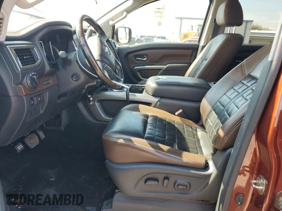 2018 Nissan Titan Pro-4X z VIN 1N6AA1E50JN526481, wystawiony jako Copart lot #71800504 z przebiegiem 147 463 mil mil oraz Szkoda całkowita • Salvage title. Historia ofert i sprzedaży dostępna na DreamBid. Obrazek 7.
