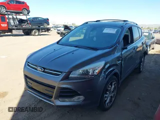 2013 Ford Escape Titanium with VIN 1FMCU0J95DUA29390, listed as a IAAI auction lot 42720269 with 147,413 mi miles and . Bid and sale history available at DreamBid. Image 6.