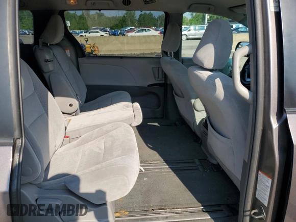 2015 Toyota Sienna LE AAS with VIN 5TDKK3DCXFS651621, listed as a Copart auction lot 66263885 with 150,578 mi miles and Salvage title. Bid and sale history available at DreamBid. Image 11.