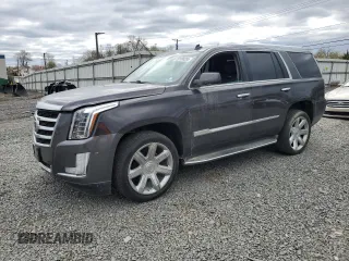 2015 Cadillac Escalade Luxury z VIN 1GYS4BKJXFR238094, wystawiony jako Copart lot #53188355 z przebiegiem Nie podano mil oraz Szkody całkowita. Historia ofert i sprzedaży dostępna na DreamBid. Obrazek 1.