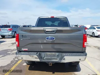 2015 Ford F-150 XLT w/HD Payload Pkg with VIN 1FTFW1EF7FKD04869, listed as a IAAI auction lot 41664736 with 165,784 mi miles. Bid and sale history available at carsss.com. Image 16.