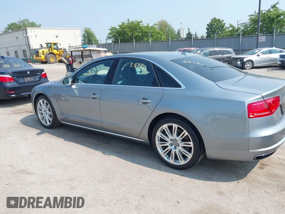 2013 Audi A8 4.0L with VIN WAUA2AFD5DN021950, listed as a IAAI auction lot 42472512 with 126,964 mi miles and . Bid and sale history available at DreamBid. Image 3.