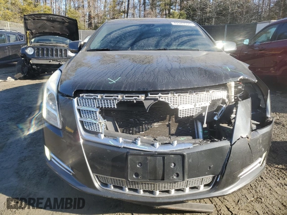 2013 Cadillac XTS Platinum z VIN 2G61V5S3XD9100843, wystawiony jako Copart lot #42943555 z przebiegiem 122 153 mil mil oraz Szkody całkowita. Historia ofert i sprzedaży dostępna na DreamBid. Obrazek 5.