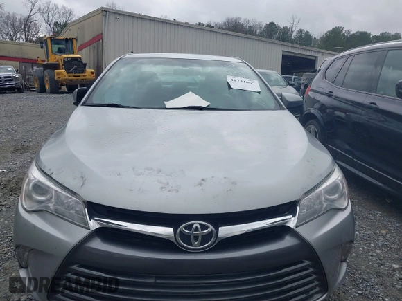 2015 Toyota Camry XLE with VIN 4T1BF1FKXFU955780, listed as a IAAI auction lot 41731667 with 210,750 mi miles and . Bid and sale history available at DreamBid. Image 12.