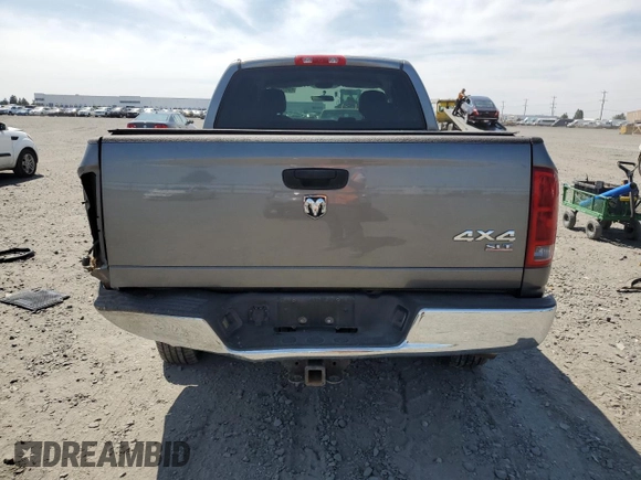 2005 Dodge 1500 SLT z VIN 1D7HU18D05S145030, wystawiony jako Copart lot #60825845 z przebiegiem 91 205 mil mil oraz Szkoda całkowita • Salvage title. Historia ofert i sprzedaży dostępna na DreamBid. Obrazek 6.