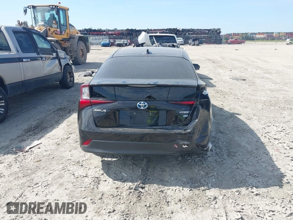 2021 Toyota Prius L Eco with VIN JTDKAMFU6M3141392, listed as a IAAI auction lot 42317866 with 137,495 mi miles and . Bid and sale history available at DreamBid. Image 15.