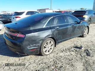 2014 Lincoln MKZ with VIN 3LN6L2GK4ER802736, listed as a IAAI auction lot 41601358 with 300,861 mi miles. Bid and sale history available at carsss.com. Image 4.
