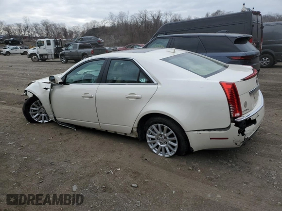 2013 Cadillac CTS Luxury with VIN 1G6DH5E52D0105143, listed as a Copart auction lot 88317345 with 50,077 mi miles and Salvage title. Bid and sale history available at DreamBid. Image 2.