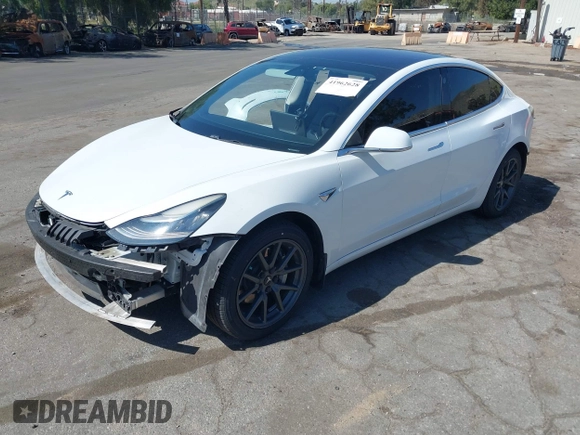 2018 Tesla Model 3 Long Range Battery with VIN 5YJ3E1EAXJF108781, listed as a IAAI auction lot 41962628 with 61,208 mi miles and . Bid and sale history available at DreamBid. Image 23.