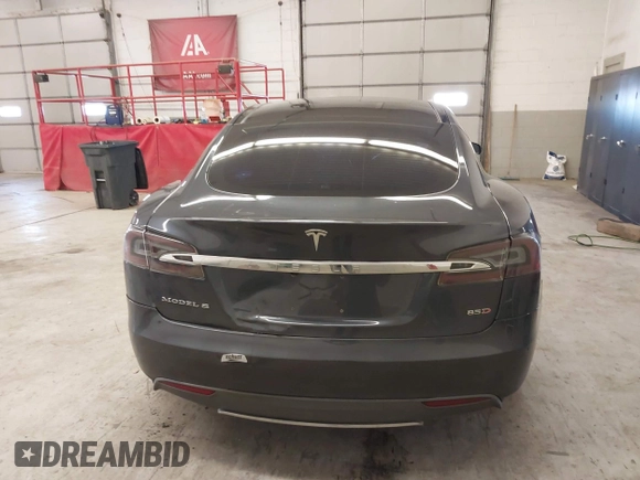 2014 Tesla Model S 60 with VIN 5YJSA1H13EFP49912, listed as a IAAI auction lot 41716661 with 129,776 mi miles and . Bid and sale history available at DreamBid. Image 17.