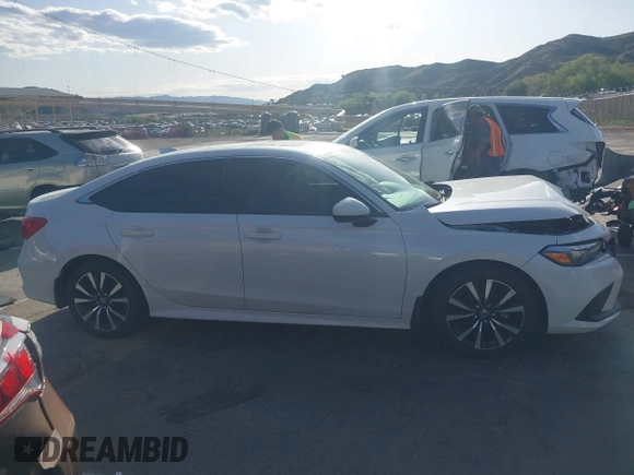 2023 Honda Civic EX z VIN 2HGFE1F78PH314024, wystawiony jako IAAI lot #41949941 z przebiegiem 33 998 mil mil oraz . Historia ofert i sprzedaży dostępna na DreamBid. Obrazek 13.