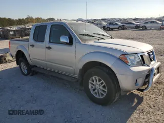 2015 Nissan Frontier S with VIN 1N6AD0EV3FN705610, listed as a Copart auction lot 77530764 with 165,782 mi miles and Salvage title. Bid and sale history available at DreamBid. Image 4.