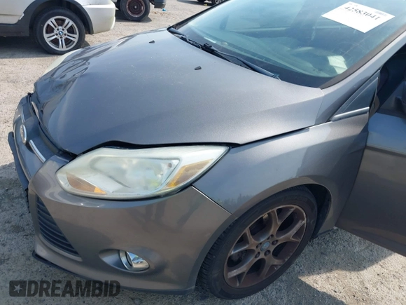 2013 Ford Focus SE with VIN 1FADP3F28DL233822, listed as a IAAI auction lot 42583041 with 135,728 mi miles and . Bid and sale history available at DreamBid. Image 15.