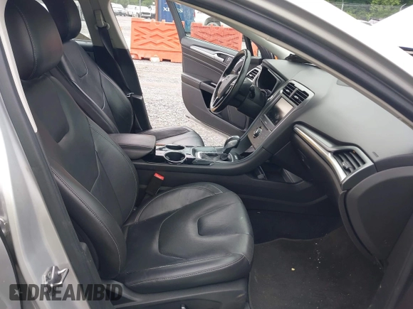 2013 Ford Fusion Titanium Hybrid with VIN 3FA6P0RU3DR281914, listed as a IAAI auction lot 42380838 with 166,956 mi miles and . Bid and sale history available at DreamBid. Image 5.