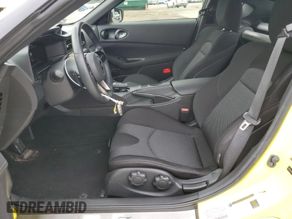 2023 Nissan Z Sport с VIN JN1BZ4AH0PM310987, выставлен на аукционе Copart как лот 74926264 с пробегом 10 474 миль миль и Списание • Salvage title. История ставок и продаж доступна на DreamBid. Изображение 7.