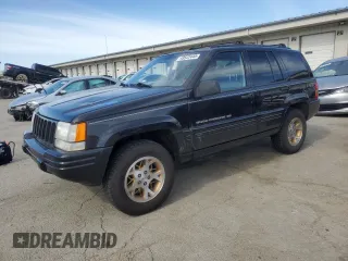 1998 Jeep Grand Cherokee Limited with VIN 1J4GZ78Y0WC140588, listed as a Copart auction lot 49522445 with 62,195 mi miles and Salvage Title. Bid and sale history available at carsss.com. Image 1.