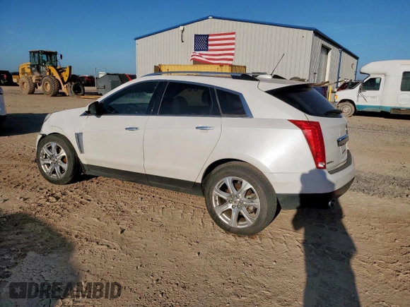 2016 Cadillac SRX Performance Collection with VIN 3GYFNCE37GS573748, listed as a Copart auction lot 66300135 with 136,619 mi miles and Salvage title. Bid and sale history available at DreamBid. Image 2.