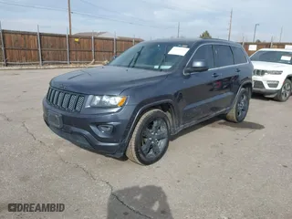 2015 Jeep Grand Cherokee Altitude with VIN 1C4RJFAG3FC608198, listed as a IAAI auction lot 41512629 with 154,647 mi miles. Bid and sale history available at carsss.com. Image 17.