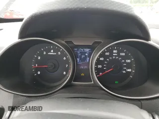 2013 Hyundai Veloster w/Red Int z VIN KMHTC6AD4DU088649, wystawiony jako Copart lot #58329295 z przebiegiem 174 798 mil mil oraz Czysty tytuł • Clean title. Historia ofert i sprzedaży dostępna na DreamBid. Obrazek 9.