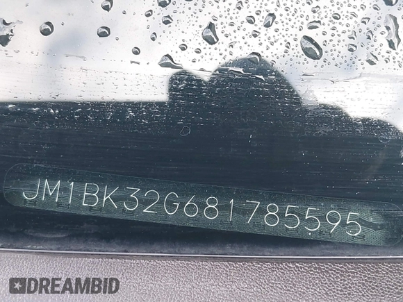 2008 Mazda 3 i Touring with VIN JM1BK32G681785595, listed as a IAAI auction lot 41815835 with 170,764 mi miles and . Bid and sale history available at DreamBid. Image 9.