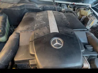 2002 Mercedes-Benz G-Class with VIN WDCYR49E22X132146, listed as a Copart auction lot 46248815 with 208,917 mi miles and Salvage Title. Bid and sale history available at carsss.com. Image 7.